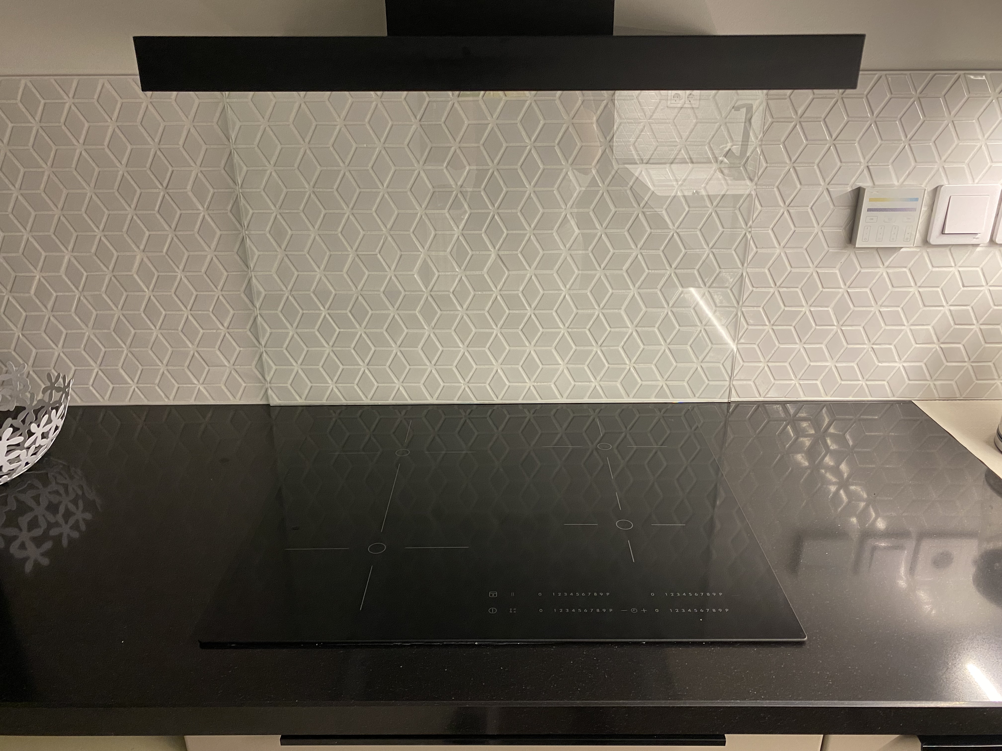 Säkerhetsglas bakom spishäll